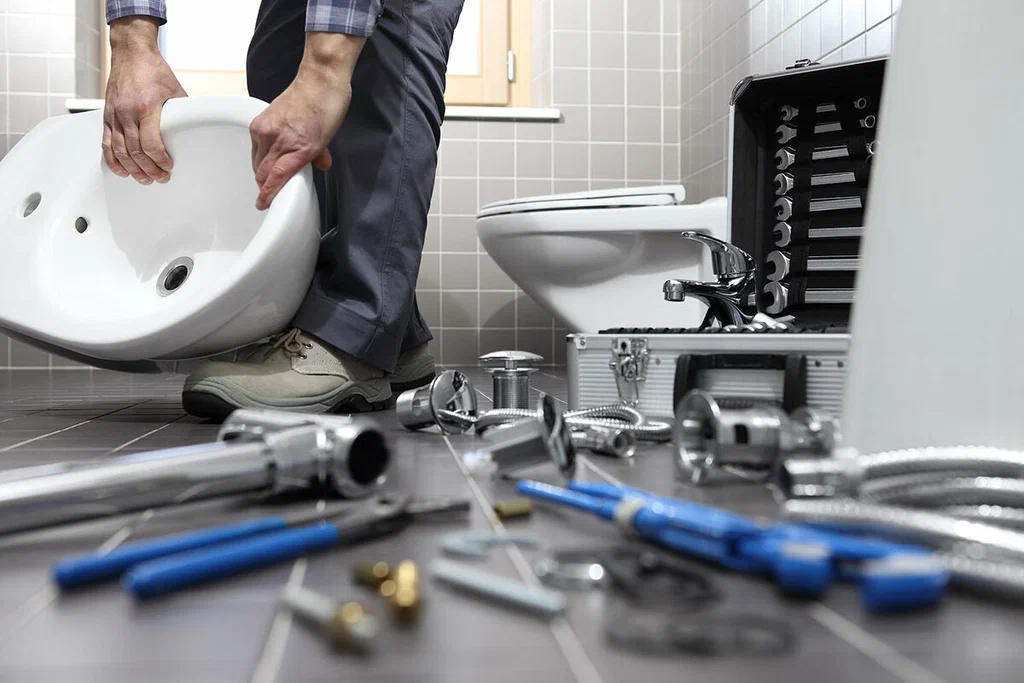 Plumbing tools prepared for a bathroom repair in Sanford
